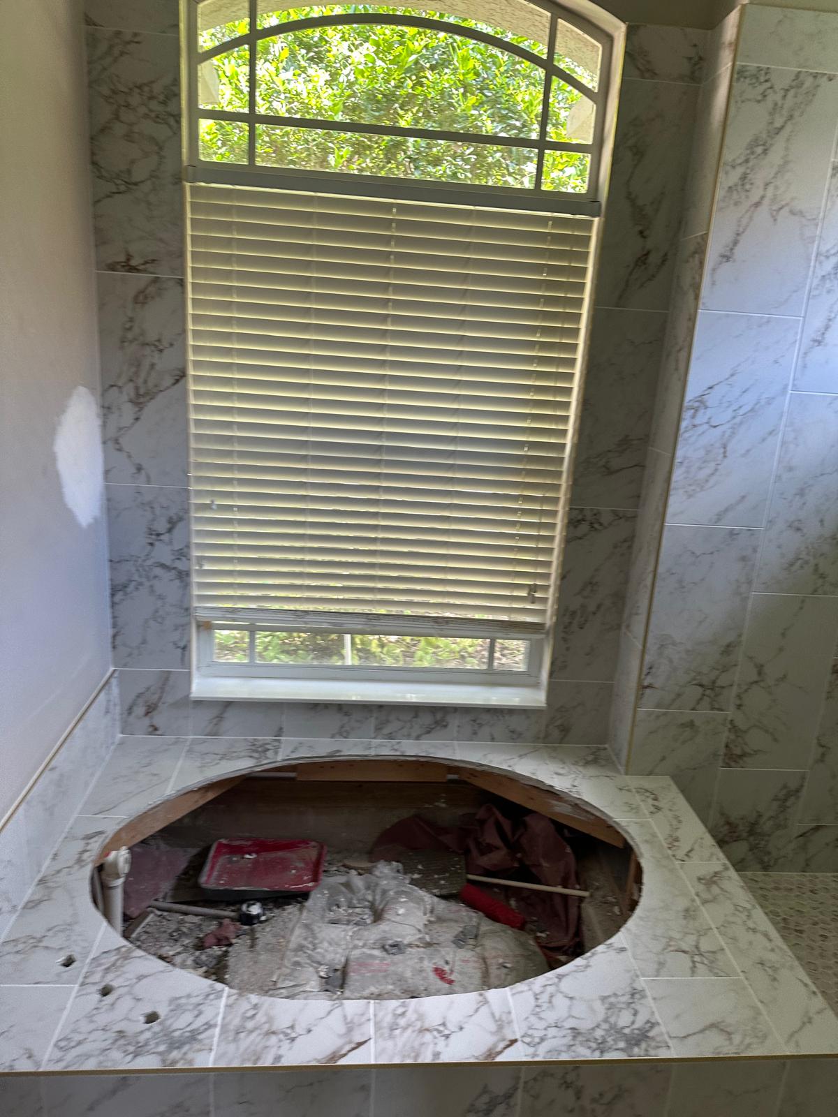 Garden tub deck opened up to diagnose a leak before rebuilding